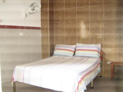 Hotel Arpa de Aguas客房内的一张或多张床位