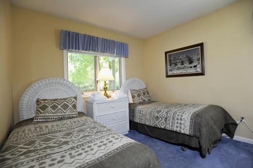 The Townhomes at Bretton Woods客房内的一张或多张床位