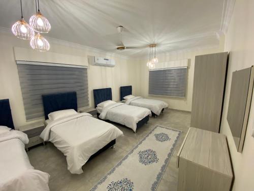 Lovely 3-bedrooms rental unit客房内的一张或多张床位