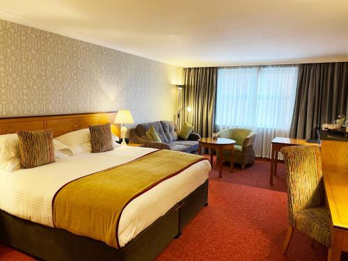 黑斯廷斯欧罗巴酒店客房内的一张或多张床位