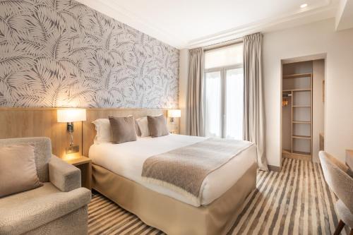 阿尔贝特王子里昂贝西酒店客房内的一张或多张床位