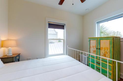 Sunshine & Sea Breezes客房内的一张或多张床位