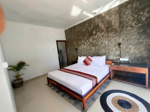 巴厘岛瑜珈旅馆客房内的一张或多张床位