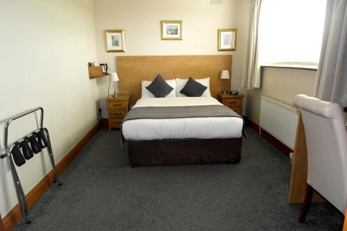 Seacourt Accommodation Tramore - Adult Only客房内的一张或多张床位