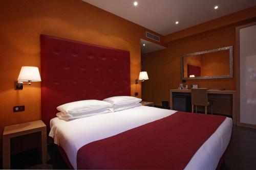 皮埃蒙特贝斯特韦斯特酒店客房内的一张或多张床位