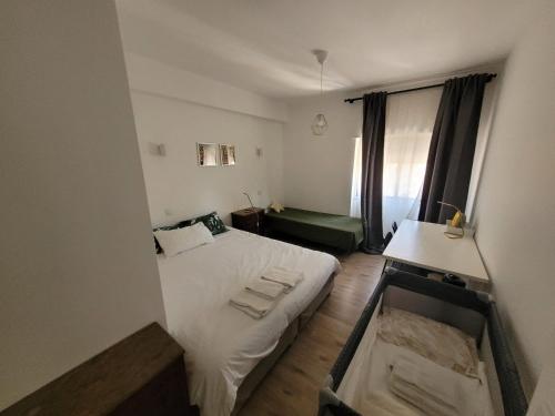 Treetops Lisbon Apartment客房内的一张或多张床位