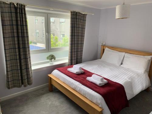 Holyrood Duplex 3- Bedrooms Apartment客房内的一张或多张床位