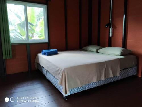 Lok Mun Bungalows客房内的一张或多张床位