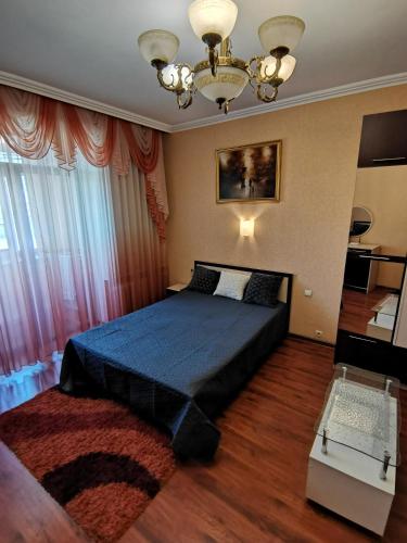 Apartment LUX Center on Boulevard Shevchenko客房内的一张或多张床位