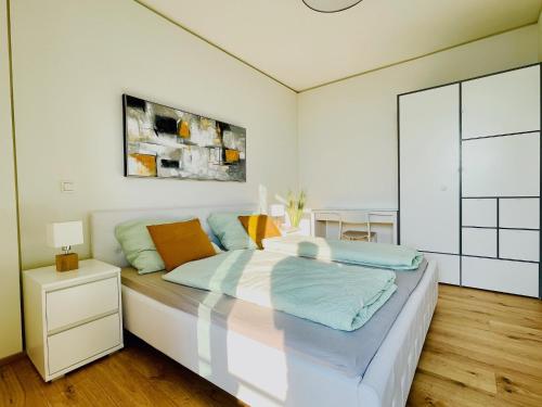 TrIIIple Level 31 - Sonnenwohnen Apartment mit fantastischem Ausblick und Parkplatz客房内的一张或多张床位