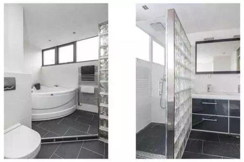尼沃海恩Cozy Dutchie House Near Utrecht的带浴缸、卫生间和盥洗盆的浴室