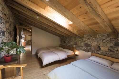 Mas rural El Negre客房内的一张或多张床位