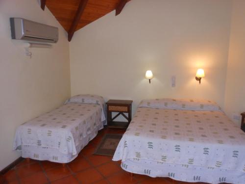 Portal de Alem Hotel客房内的一张或多张床位