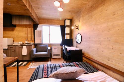 札幌Culture24的带两张床的房间和厨房