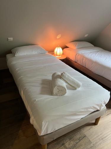 Le Domaine des Bois客房内的一张或多张床位
