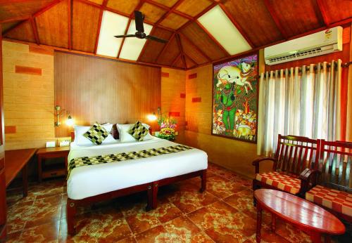 Cherai Beach Resorts客房内的一张或多张床位