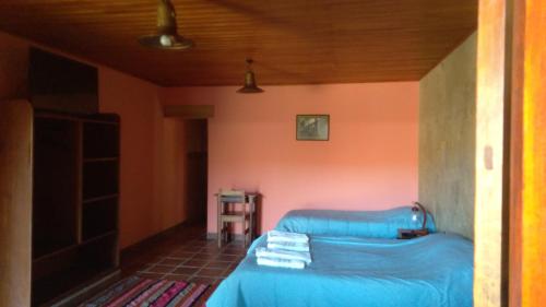 hosteria camino del inca客房内的一张或多张床位