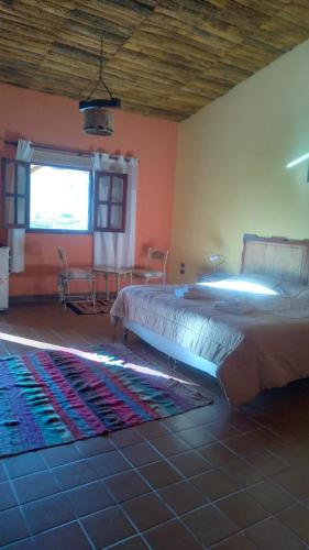hosteria camino del inca客房内的一张或多张床位