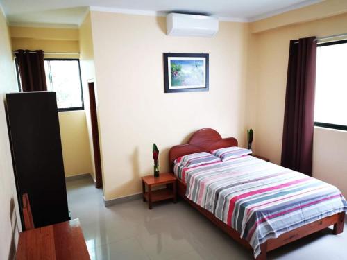 Hostal Cordillera Azul客房内的一张或多张床位