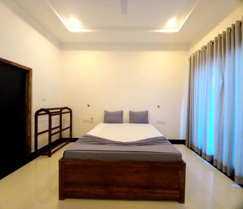 卡尔库达Hotel krish的卧室配有一张床