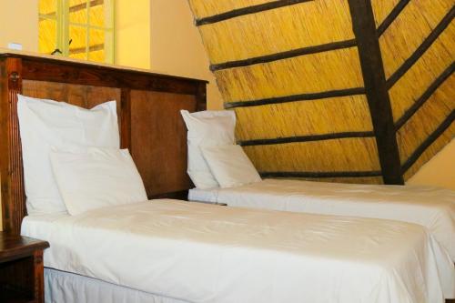 Mapelepele Cottage客房内的一张或多张床位