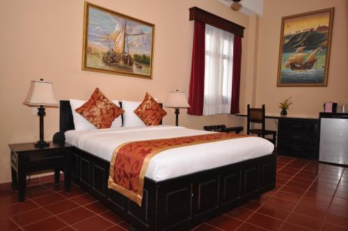 帕拉西奥精品酒店客房内的一张或多张床位
