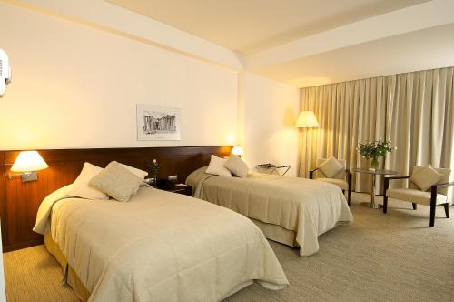 翁图尔伊兹密尔酒店客房内的一张或多张床位
