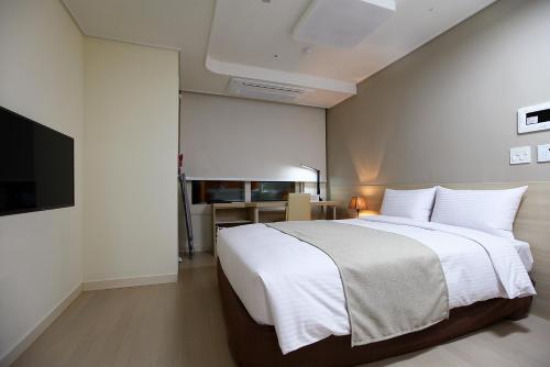 江南城市广场酒店客房内的一张或多张床位