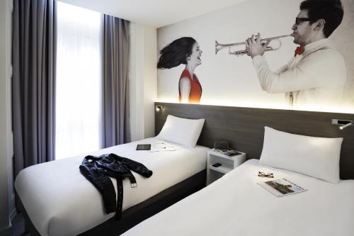 Heeton Concept Hotel - Kensington London客房内的一张或多张床位