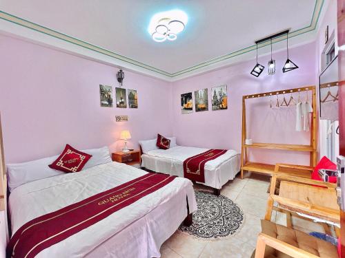 Quang Bình Hotel Sapa客房内的一张或多张床位