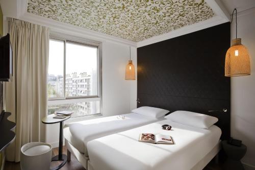巴黎巴茨肖蒙宜必思时尚酒店 客房内的一张或多张床位