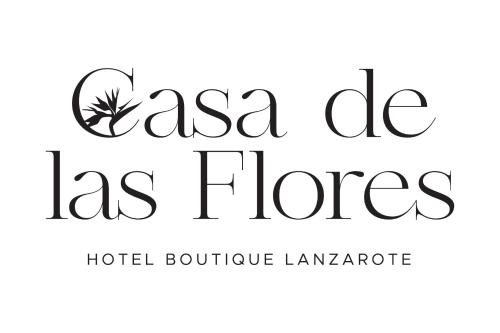 特吉塞Casa de las Flores - Hotel Boutique Lanzarote的酒店精品景观的手写字体
