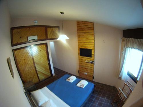 维坎尼塔酒店与小屋度假村客房内的一张或多张床位