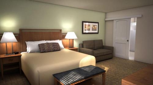 安克雷奇阿斯彭套房酒店客房内的一张或多张床位