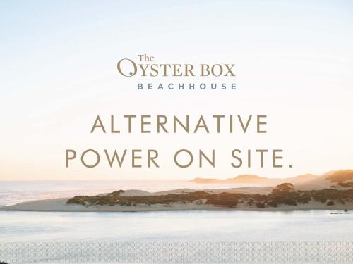 滨海肯顿The Oyster Box Beach House by The Oyster Collection的海滩的图片,上面引用牡 ⁇ 盒浴室的替代电源