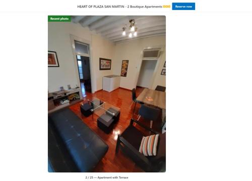 利马HEART OF PLAZA SAN MARTIN - 2 Boutique Apartments的客厅配有沙发和椅子