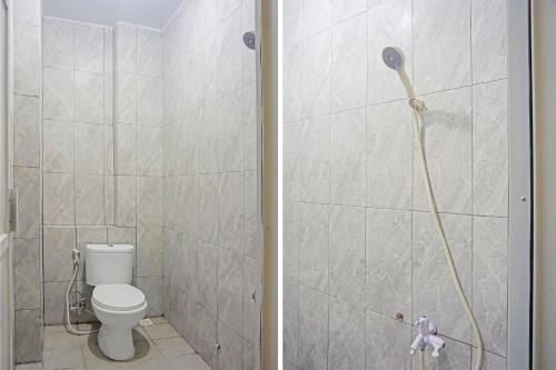 当格浪SUPER OYO Capital O 91790 S1 Residence的一间带卫生间和淋浴的浴室