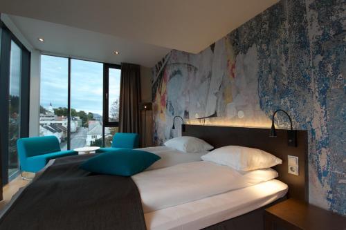 Comfort Hotel Victoria Florø客房内的一张或多张床位
