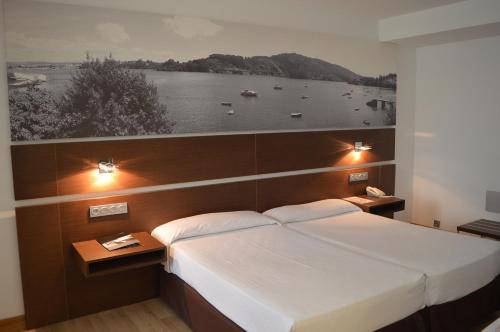 奥登赛克特尔SPA酒店客房内的一张或多张床位
