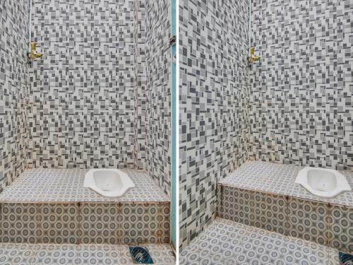 ParitSPOT ON 91834 Sg 99 Homestay Syariah的浴室配有淋浴和卫生间。