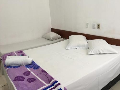Hotel Foz Brasil客房内的一张或多张床位