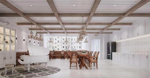 杭州杭州灯火阑珊青年旅舍的一间配备有桌子和白色钢琴的用餐室