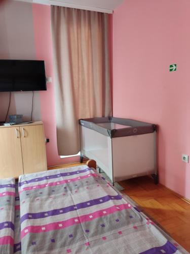 Apartman “MEGI”客房内的一张或多张床位