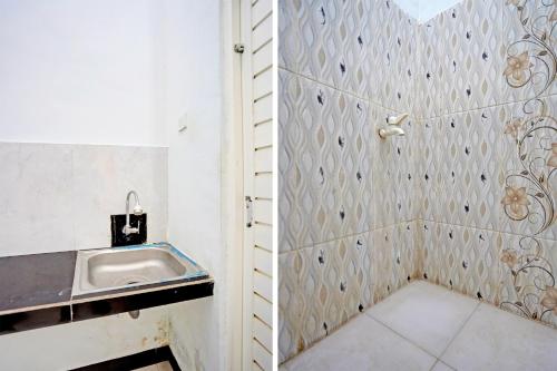 MojokertoOYO Life 91866 Paradise Ok Kost Syariah的一间带水槽和瓷砖墙的浴室