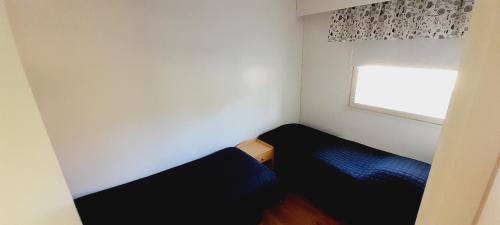 Huoneisto Pyy客房内的一张或多张床位