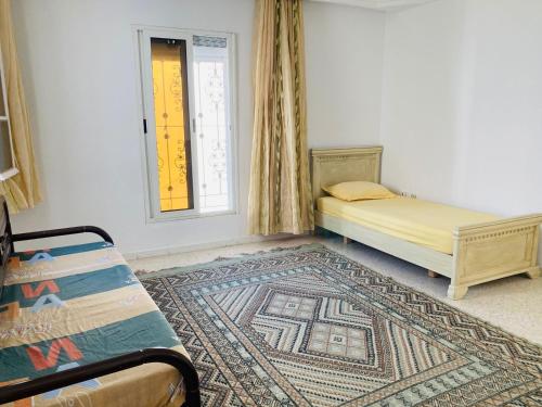 Djerba Dar BAYA客房内的一张或多张床位