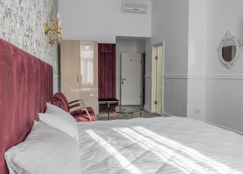Hotel Vila Central Boutique Satu Mare客房内的一张或多张床位
