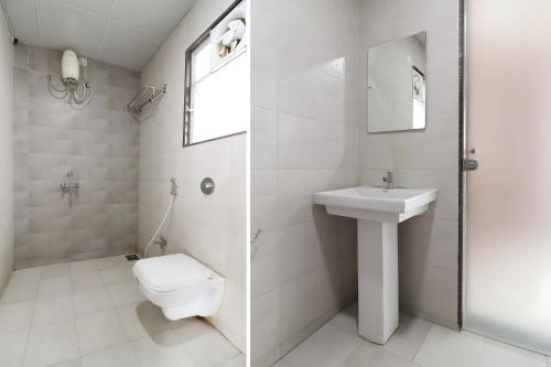 浦那Hotel Gaurav Residency的一间带卫生间和水槽的浴室