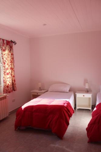 HOSPEDAR CALAFATE - Los Lupinos客房内的一张或多张床位