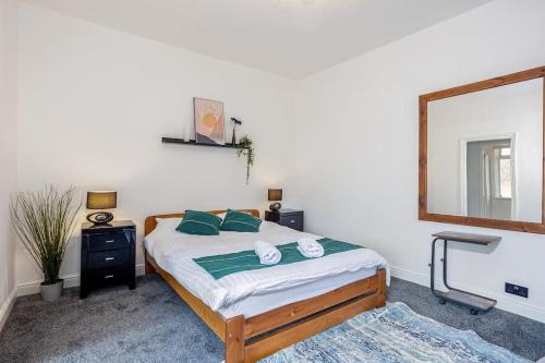 Stylish 3 Bedroom Central Property客房内的一张或多张床位